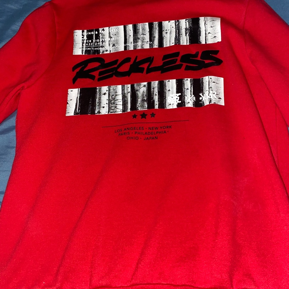 Red Young and Reckless Long Sleeve Sweatshirt